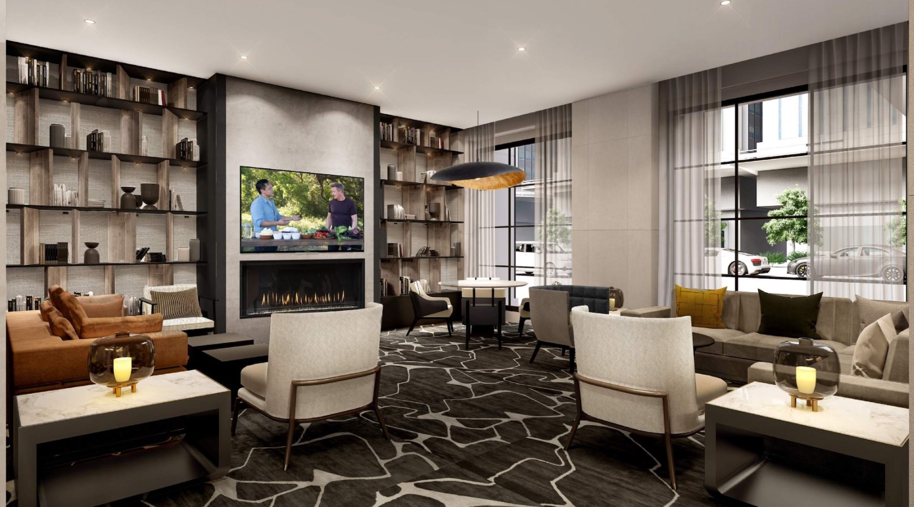 a living room with a tv and chairs