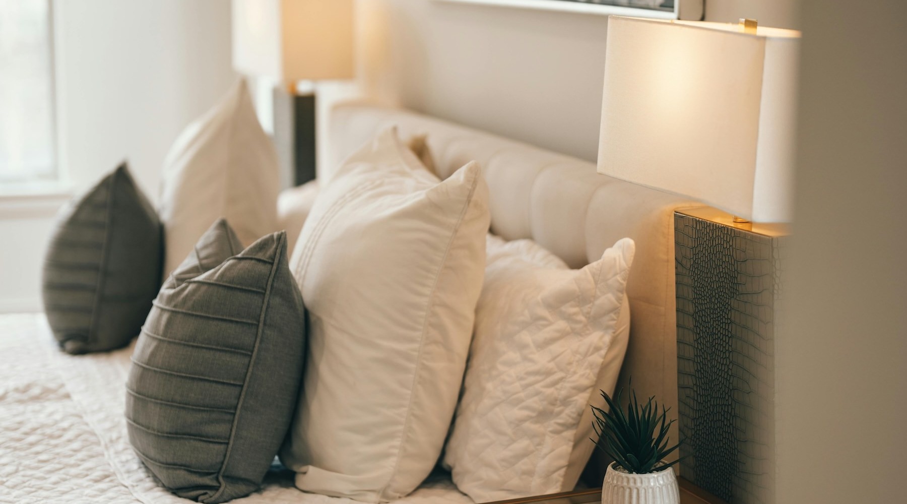 a bed with pillows