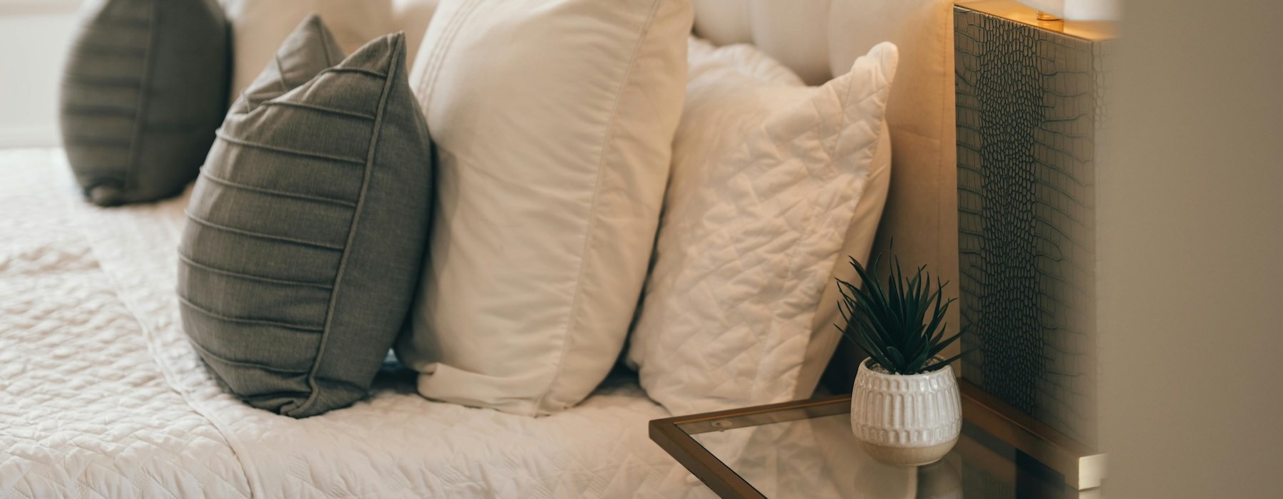 a bed with pillows
